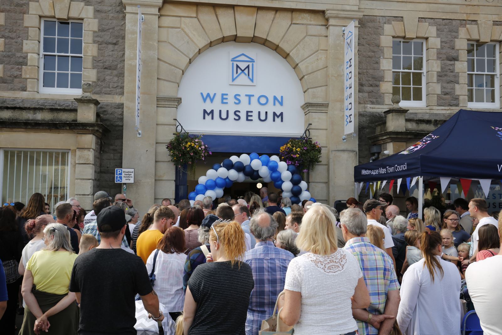 Crowds of people outside Weston Museum on its opening 50 years ago
